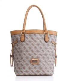 The scandal would be to leave it home! With GUESS's signature quatrefois G monogram print, side drawstrings and a tall, elegant size that's the right size for shopping, this chic carryall will be your go-to bag. The scandal would be to leave it home! With GUESS's signature quatrefois G monogram print, side drawstrings and a tall, elegant size that's the right size for shopping, this chic carryall will be your go-to bag.