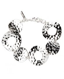 For style that's flexible and flauntable -- just add this chic circular style by Nine West. Crafted in silver tone mixed metal, interlocking circles shine with textured edges. Approximate length: 7-1/4 inches. For style that's flexible and flauntable -- just add this chic circular style by Nine West. Crafted in silver tone mixed metal, interlocking circles shine with textured edges. Approximate length: 7-1/4 inches.
