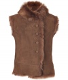 Achieve the trend-right layered luxe look in this sumptuous lambskin vest from Joseph - Fur collar, sleeveless, front button placket, fur-trimmed front and hem, fur inside - Fitted - Wear with a bohemian-inspired blouse or dress, a fringed scarf, and over-the-knee boots