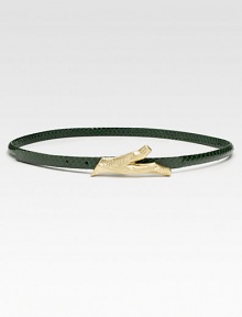 A skinny, supple rattlesnake leather belt with a brass twig closure.Width, about .5Imported A skinny, supple rattlesnake leather belt with a brass twig closure.Width, about .5Imported