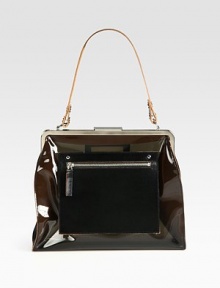 A modern and avant-garde brand with beautifully-crafted pieces such as this chic transparent design accented with luxurious leather accents.Leather top handle, 8 dropTop clasp closureOutside pocketsPlastic12¾W X 7H X 4DMade in Italy