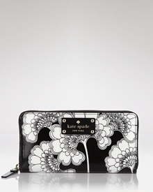 Hit print with this graphic wallet from kate spade new york. With spots for the essentials, it proves practical accessorizing can make a statement.