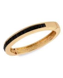 Understated elegance. This bracelet from Kenneth Cole New York is crafted from gold-tone mixed metal, with jet-colored accents giving it a formal feel. Approximate diameter: 2-1/4 inches. Understated elegance. This bracelet from Kenneth Cole New York is crafted from gold-tone mixed metal, with jet-colored accents giving it a formal feel. Approximate diameter: 2-1/4 inches.