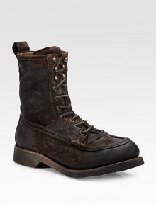 A rugged look with urban flavor in oiled suede, finished with rawhide laces and a hard rubber outsole. Leather pull Shaft, 7½ Leather lining Padded insole Rubber sole Made in Italy A rugged look with urban flavor in oiled suede, finished with rawhide laces and a hard rubber outsole. Leather pull Shaft, 7½ Leather lining Padded insole Rubber sole Made in Italy