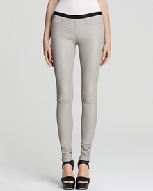These supple Helmut Lang leggings are the season's it piece--lush and luxurious in lamb leather and oh-so sleek in an über-skinny silhouette. Keep the look relaxed and pair them with a tee or opt for a silk top and work it to the max. These supple Helmut Lang leggings are the season's it piece--lush and luxurious in lamb leather and oh-so sleek in an über-skinny silhouette. Keep the look relaxed and pair them with a tee or opt for a silk top and work it to the max.