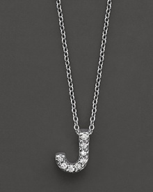 From the Tiny Treasures collection, a diamond J necklace. With signature ruby accent. Designed by Roberto Coin. From the Tiny Treasures collection, a diamond J necklace. With signature ruby accent. Designed by Roberto Coin.