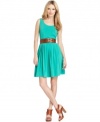 Outfitted in a fresh color and accessorized with a matching belt, Calvin Klein's dress is full of spring appeal.