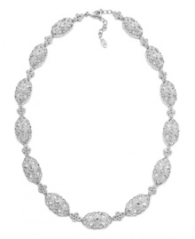 A sparkling sensation with a vintage aesthetic. Eliot Danori's elegant oval-shaped collar necklace features an ornate link pattern decorated with round-cut cubic zirconias (1 ct. t.w.) and sparkling crystals. Set in silver tone mixed metal. Approximate length: 16 inches + 2-inch extender. A sparkling sensation with a vintage aesthetic. Eliot Danori's elegant oval-shaped collar necklace features an ornate link pattern decorated with round-cut cubic zirconias (1 ct. t.w.) and sparkling crystals. Set in silver tone mixed metal. Approximate length: 16 inches + 2-inch extender.