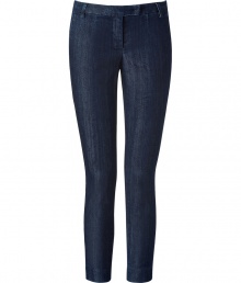 Dark blue stretch cotton denim - Vertical streaked wash - Low rise - Cropped above ankle - Chino-style tab waist detail and back pockets - Feminine cut with simple, masculine styling - Pair with cashmere pullovers, button downs and ballerina flats