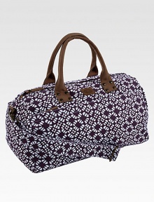 A graphic floral pattern is both sweet and sophisticated, printed on sturdy cotton in a roomy duffel.Top zip closureLeather double handlesDetachable, adjustable shoulder strapInside and outside zip pockets18¾L X 9½H X 9¼DCottonSpot cleanImported A graphic floral pattern is both sweet and sophisticated, printed on sturdy cotton in a roomy duffel.Top zip closureLeather double handlesDetachable, adjustable shoulder strapInside and outside zip pockets18¾L X 9½H X 9¼DCottonSpot cleanImported
