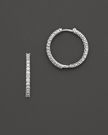 Inside/outside diamond hoop earrings; with signature ruby accent. Post closure for pierced ears. Designed by Roberto Coin. Inside/outside diamond hoop earrings; with signature ruby accent. Post closure for pierced ears. Designed by Roberto Coin.