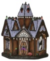 Built with the look of real gingerbread, colorful gumdrops and sugar-coated frosting, this Byers' Choice collectible is a sweet retreat for some, a haunted house for others.