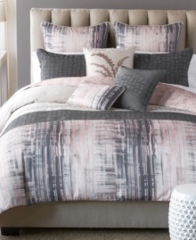 Define your space with unexpected design. A sleek gray color is softened by the relaxing pink hues of a perfect sunset in this Horseshoe Bay comforter set from Bryan Keith for a fresh, modern look. Flip the comforter for a soothing leaf design that gives your room a whole new look.