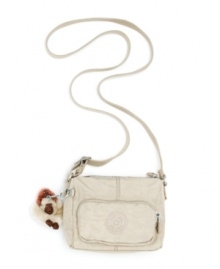 Kipling's Tedros crossbody purse shows off your sporty side, in durable, modern 420 denier nylon. Kipling's Tedros crossbody purse shows off your sporty side, in durable, modern 420 denier nylon.