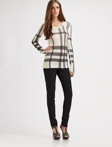 Supple, finely-knit silk, printed with a dynamic exploded check pattern.ScoopneckLong sleevesWaffle knitSilkDry cleanImportedPattern may vary Supple, finely-knit silk, printed with a dynamic exploded check pattern.ScoopneckLong sleevesWaffle knitSilkDry cleanImportedPattern may vary