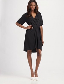 The famous wrap dress is redesigned and refined in softly structured silk with hardware details.Crossover front Short sleeves Self tie belt with metal tips Gathered at center back waist About 23 from natural waist 95% silk/5% spandex Dry clean Imported The famous wrap dress is redesigned and refined in softly structured silk with hardware details.Crossover front Short sleeves Self tie belt with metal tips Gathered at center back waist About 23 from natural waist 95% silk/5% spandex Dry clean Imported