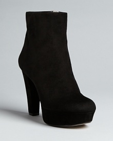 These perfect fashion basics deserve a shelf in every shoe closet, defining sleek chic in platform bootie form: from KORS Michael Kors. These perfect fashion basics deserve a shelf in every shoe closet, defining sleek chic in platform bootie form: from KORS Michael Kors.