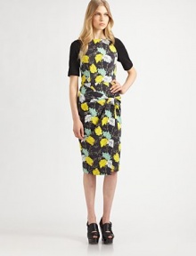 This panel-constructed design is patterned with a painterly leaf print.Square necklineElbow-length raglan sleevesFaux wrap skirtPick-up detail at hipTrimmed back zipSilk liningAbout 26 from natural waistSleeves and back: 53% silk/41% nylon/6% elastaneBody: neopreneDry cleanMade in USA of Italian fabricModel shown is 5'11 (180cm) wearing US size 4. This panel-constructed design is patterned with a painterly leaf print.Square necklineElbow-length raglan sleevesFaux wrap skirtPick-up detail at hipTrimmed back zipSilk liningAbout 26 from natural waistSleeves and back: 53% silk/41% nylon/6% elastaneBody: neopreneDry cleanMade in USA of Italian fabricModel shown is 5'11 (180cm) wearing US size 4.