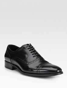A modern classic, expertly constructed in sleek Italian leather.Leather upperLeather liningPadded insoleRubber soleMade in Italy A modern classic, expertly constructed in sleek Italian leather.Leather upperLeather liningPadded insoleRubber soleMade in Italy