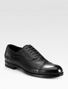 Handsome leather oxford with impeccable hand stitching and painting, exuding expert Italian craftsmanship and attention to detail.Leather upperLeather liningPadded insoleRubber soleMade in Italy Handsome leather oxford with impeccable hand stitching and painting, exuding expert Italian craftsmanship and attention to detail.Leather upperLeather liningPadded insoleRubber soleMade in Italy
