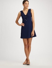 Navy stretch knit has a chic lace-up front for instant nautical flare.Wide straps V neckline Empire seam Pullover style About 15 from natural waist 72% nylon/28% Lycra Hand wash Made in USA of Italian fabric Navy stretch knit has a chic lace-up front for instant nautical flare.Wide straps V neckline Empire seam Pullover style About 15 from natural waist 72% nylon/28% Lycra Hand wash Made in USA of Italian fabric