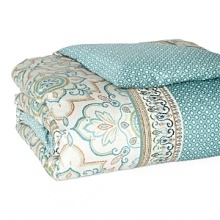 Inspired by artisan block prints, this Sky bedding collection is a burst of pattern, color and rich embroidery in 230-thread count sateen. Duvet features a floral medallion print in marine, teal, olive and rust in the center, framed by a detailed embroidered print and panels of a distressed dot pattern in blue, also on reverse. Shams feature the same floral medallion print and reverse to the distressed dot pattern, with side tie closures. Inspired by artisan block prints, this Sky bedding collection is a burst of pattern, color and rich embroidery in 230-thread count sateen. Duvet features a floral medallion print in marine, teal, olive and rust in the center, framed by a detailed embroidered print and panels of a distressed dot pattern in blue, also on reverse. Shams feature the same floral medallion print and reverse to the distressed dot pattern, with side tie closures.