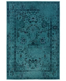 Distressed never looked so rich. The Revamp area rug from Sphinx takes a vintage-inspired damask motif and updates its heirloom appeal with modern, faded styling in vibrant turquoise. Created in the USA of ultra-tough, hard-twist polypropylene. Distressed never looked so rich. The Revamp area rug from Sphinx takes a vintage-inspired damask motif and updates its heirloom appeal with modern, faded styling in vibrant turquoise. Created in the USA of ultra-tough, hard-twist polypropylene.