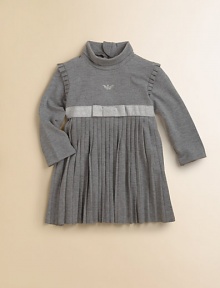 A classic design with pretty pleats and a sparkly ribbon in a turtleneck frock silhouette.TurtleneckLong sleevesBack zipperWaistband with ribbon detailPleated skirt74% viscose/20% polyester/6% elastaneDry cleanImported A classic design with pretty pleats and a sparkly ribbon in a turtleneck frock silhouette.TurtleneckLong sleevesBack zipperWaistband with ribbon detailPleated skirt74% viscose/20% polyester/6% elastaneDry cleanImported