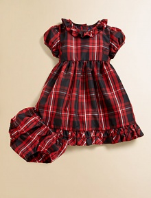 A party-ready dress features all the right details, including a classic plaid pattern and pretty ruffles for a festive look.Ruffle-trimmed crewneckShort puff sleevesBack buttonsEmpire waist with velvet sash and jeweled buckle claspFully linedCottonMachine washImported Please note: Number of buttons may vary depending on size ordered. A party-ready dress features all the right details, including a classic plaid pattern and pretty ruffles for a festive look.Ruffle-trimmed crewneckShort puff sleevesBack buttonsEmpire waist with velvet sash and jeweled buckle claspFully linedCottonMachine washImported Please note: Number of buttons may vary depending on size ordered.