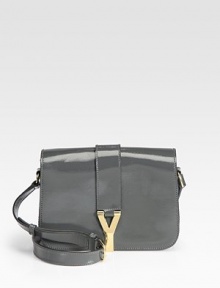Shoulder style in luxe patent leather with signature golden hardware.Adjustable buckle shoulder strap, 20-22 drop Magnetic flap closure One inside zip pocket Cotton lining 3W X 6½H X 9½D Made in Italy Shoulder style in luxe patent leather with signature golden hardware.Adjustable buckle shoulder strap, 20-22 drop Magnetic flap closure One inside zip pocket Cotton lining 3W X 6½H X 9½D Made in Italy