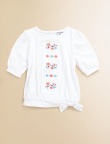 A charming short-sleeved top in soft cotton is accented with a blooming bouquet of embroidered flowers to inspire warm thoughts.Round necklineShort puff sleevesBack button closureTie hemCottonMachine washImported Please note: Number of buttons may vary depending on size ordered. A charming short-sleeved top in soft cotton is accented with a blooming bouquet of embroidered flowers to inspire warm thoughts.Round necklineShort puff sleevesBack button closureTie hemCottonMachine washImported Please note: Number of buttons may vary depending on size ordered.