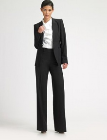 Smooth stretch wool pants with wide, straight legs.Wide waistband with hook-and-eye Belt loops Flat front with zip closure Inseam, about 35 96% virgin wool/4% elastane Dry clean Imported