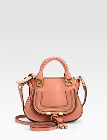 Iconic leather-wrapped top handles and topstitch detailing define this casual classic.Tennis-wrapped double top handles, 4Removable crossbody strap, 20 dropTop zip closureOne inside open pocketCotton lining7W X 5H X 3DMade in Italy Iconic leather-wrapped top handles and topstitch detailing define this casual classic.Tennis-wrapped double top handles, 4Removable crossbody strap, 20 dropTop zip closureOne inside open pocketCotton lining7W X 5H X 3DMade in Italy