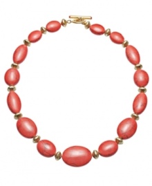 Breezy beach style. Lauren by Ralph Lauren's summer-chic style warms up any look with reconstituted coral beads and gold tone mixed metal accents. Approximate length: 18 inches.