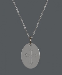 Express your sense of faith and style simultaneously! This polished, oval pendant highlights an intricate, engraved cross in sterling silver. Approximate length: 18 inches. Approximate drop: 3/4 inch. Express your sense of faith and style simultaneously! This polished, oval pendant highlights an intricate, engraved cross in sterling silver. Approximate length: 18 inches. Approximate drop: 3/4 inch.