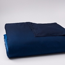 Evocative of a tranquil retreat - crisp white, deep indigo and a mélange of watercolor blues recall the place on the horizon where the sea meets the sky. Subtle woven textures of cotton and raffia complete the collection's breezy, relaxed ambiance. Evocative of a tranquil retreat - crisp white, deep indigo and a mélange of watercolor blues recall the place on the horizon where the sea meets the sky. Subtle woven textures of cotton and raffia complete the collection's breezy, relaxed ambiance.
