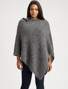 A romantic neckline and relaxed fit ensure this sparkling poncho will be a complementary layer for your favorite wardrobe. Pull-on styleAsymmetrical hemAbout 25 from shoulder to hemMohair/nylon/wool/polyester/acrylic/alpacaDry cleanImported of Italian fabric