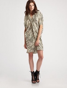A slouchy shift of printed silk with soft ruching at the neck and shoulders for a modern shape.V necklineDropped shouldersShort sleevesFoldover placketTapered backAbout 19½ from natural waistSilkDry cleanImported A slouchy shift of printed silk with soft ruching at the neck and shoulders for a modern shape.V necklineDropped shouldersShort sleevesFoldover placketTapered backAbout 19½ from natural waistSilkDry cleanImported