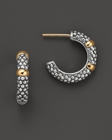 Sterling silver small caviar hoop earring with 18 Kt. accents. Designed by Lagos.
