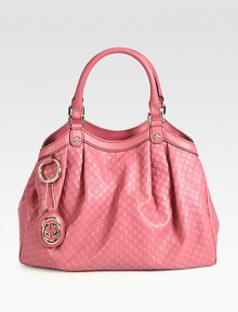 Some totes have all the fun. The Sukey carry-all will take you from day to night and into the weekend.Dark pink soft microguccissima leatherDark pink leather trimLight fine gold hardwareDouble handles, 7 dropTab snap closure and side snapsDetachable interlocking G leather tagInterior zip pocketNatural cotton linen liningMedium size: 13W x 9.8H x 4.3DMade in Italy Some totes have all the fun. The Sukey carry-all will take you from day to night and into the weekend.Dark pink soft microguccissima leatherDark pink leather trimLight fine gold hardwareDouble handles, 7 dropTab snap closure and side snapsDetachable interlocking G leather tagInterior zip pocketNatural cotton linen liningMedium size: 13W x 9.8H x 4.3DMade in Italy
