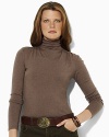 Delicate shirring and shimmering logo buttons lend modern appeal to an essential mockneck sweater in luxe silk and cotton jersey.