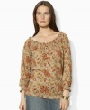 Lauren Jeans Co.'s rustic-inspired floral pattern and smocked details lend bohemian appeal to a soft cotton top.