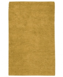 Nothing creates a warmer welcome than a rich, felted wool rug in a soothing golden hue. This luxurious piece features an undeniably soft hand, created with the finest hand-woven New Zealand wool.