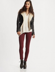 Glimmering lamb leather in a slightly cropped silhouette with a soft shearling collar and strategically placed zippers. Shearling collarZippered front slash pocketsFront zipperLong sleeves with zippered cuffsAbout 21 from shoulder to hemBody: LeatherTrim: ShearlingDry clean with fur specialistImportedFur origin: New ZealandModel shown is 5'10 (177cm) wearing US size Small. Glimmering lamb leather in a slightly cropped silhouette with a soft shearling collar and strategically placed zippers. Shearling collarZippered front slash pocketsFront zipperLong sleeves with zippered cuffsAbout 21 from shoulder to hemBody: LeatherTrim: ShearlingDry clean with fur specialistImportedFur origin: New ZealandModel shown is 5'10 (177cm) wearing US size Small.