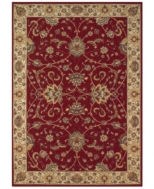 Evoking the strong look of ancient Sarouk rug designs, the Premier area rug from Dalyn is woven with intricate floral medallions in rich burgundy. Made in Egypt of durable polypropylene and shimmering polyester fibers, it provides any room with captivating texture and added dimension.
