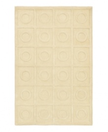 A clean, quiet design of geometric shapes presents a perfectly symmetrical pattern on this ivory-beige rug. Hand-tufted in India, this alluring piece features a raised surface feel that is soft to the touch and durable enough for the most active indoor environments. A clean, quiet design of geometric shapes presents a perfectly symmetrical pattern on this ivory-beige rug. Hand-tufted in India, this alluring piece features a raised surface feel that is soft to the touch and durable enough for the most active indoor environments.