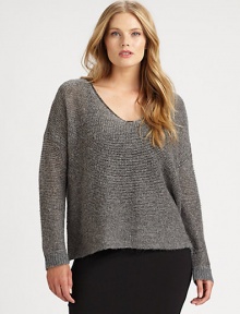 A shimmering display of sophistication, a pullover design made from Italian fabrication. It will look phenomenal with straight-leg pants or skinnies.ScoopneckDolman sleevesRibbed-knit cuffsPull-on styleAbout 23 from shoulder to hemViscose/nylon/alpaca/metallic thread/woolDry cleanImported of Italian fabric