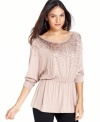 Dress up your everyday with this top from Grace Elements.