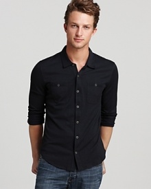 The button-down silhouette of this sport shirt contrasts with the soft knit blend of plush silk and cotton for a luxe, innovative design from John Varvatos. The button-down silhouette of this sport shirt contrasts with the soft knit blend of plush silk and cotton for a luxe, innovative design from John Varvatos.