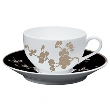 From Raynaud in Limoges porcelain, a modern, Asian-influenced pattern in black, white, and yellow with platinum bordering. Mix in yellow saucers and buffet plates to make the pattern pop. From Raynaud in Limoges porcelain, a modern, Asian-influenced pattern in black, white, and yellow with platinum bordering. Mix in yellow saucers and buffet plates to make the pattern pop.